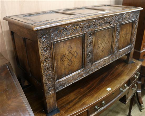 A Jacobean style oak panelled coffer, W.107cm